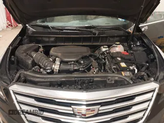 2019 Cadillac XT5 Premium Luxury AWD z VIN 1GYKNFRSXKZ189590, wystawiony jako IAAI lot #41316561 z przebiegiem 98 755 mil mil oraz . Historia ofert i sprzedaży dostępna na DreamBid. Obrazek 10.
