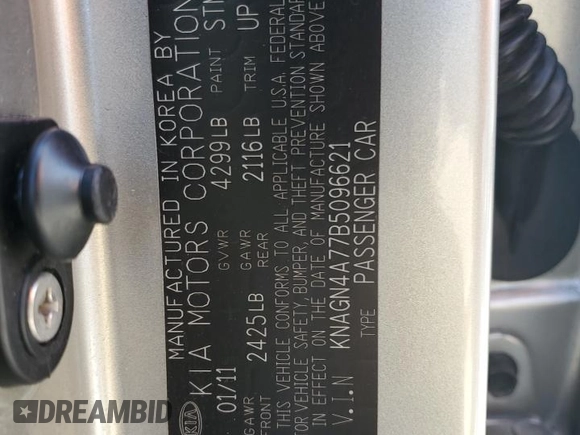 2011 Kia Optima EX z VIN KNAGN4A77B5096621, wystawiony jako Copart lot #53087945 z przebiegiem 189 899 mil mil oraz Szkoda całkowita • Salvage title. Historia ofert i sprzedaży dostępna na DreamBid. Obrazek 12.