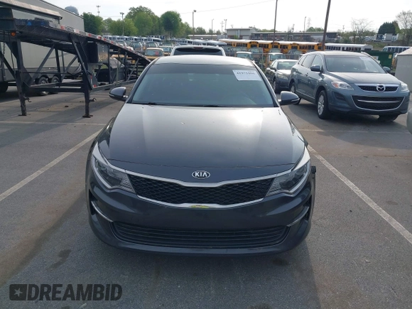2016 Kia Optima LX with VIN KNAGT4L33G5107444, listed as a IAAI auction lot 41971006 with 174,997 mi miles. Bid and sale history available at carsss.com. Image 12.
