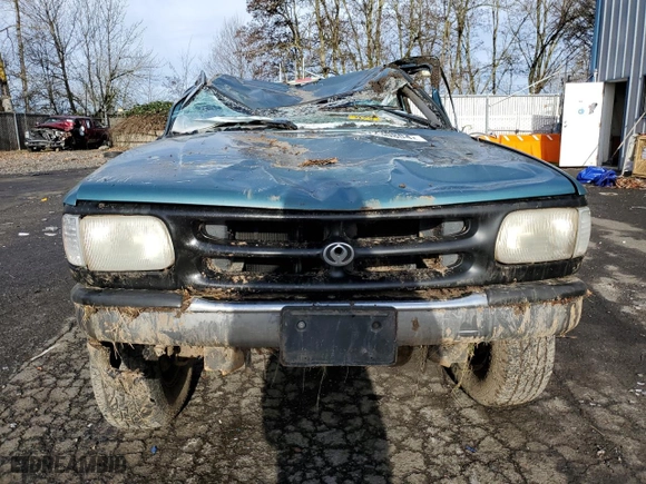 1994 Mazda B-Series 4WD Truck LE with VIN 4F4DR17X5RTN10704, listed as a Copart auction lot 87230804 with 227,476 mi miles and Salvage Title. Bid and sale history available at carsss.com. Image 5.
