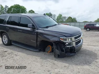 2018 Chevrolet Tahoe LT with VIN 1GNSKBKCXJR103730, listed as a IAAI auction lot 42125208 with 212,360 mi miles and . Bid and sale history available at DreamBid. Image 6.