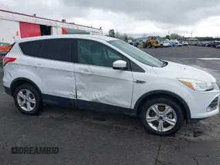 2013 Ford Escape SE with VIN 1FMCU9G93DUA17816, listed as a IAAI auction lot 41688140 with 129,738 mi miles. Bid and sale history available at carsss.com. Image 6.