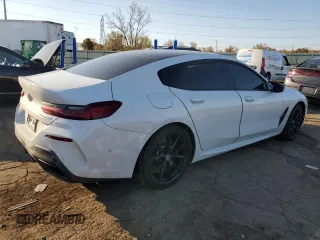 2023 BMW 8 Series M850i with VIN WBAGV8C01PCL31007, listed as a Copart auction lot 76536874 with Not Provided miles and Clean Title. Bid and sale history available at carsss.com. Image 3.