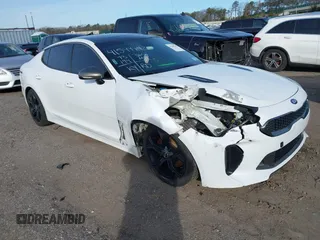 2020 Kia Stinger GT-Line with VIN KNAE15LA0L6081066, listed as a IAAI auction lot 41599142 with 73,199 mi miles. Bid and sale history available at carsss.com. Image 1.
