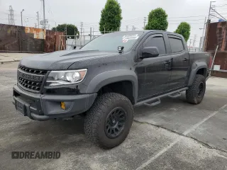 2021 Chevrolet Colorado 4WD ZR2 with VIN 1GCGTEEN3M1293299, listed as a Copart auction lot 59809995 with 21,890 mi miles and Salvage title. Bid and sale history available at DreamBid. Image 1.