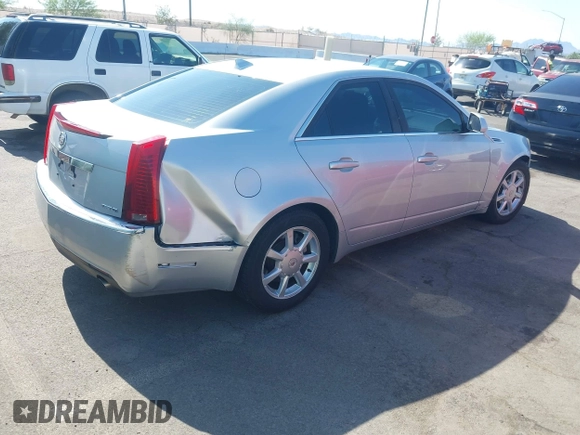 2009 Cadillac CTS RWD z VIN 1G6DU57VX90143820, wystawiony jako IAAI lot #42450086 z przebiegiem 170 656 mil mil oraz . Historia ofert i sprzedaży dostępna na DreamBid. Obrazek 4.