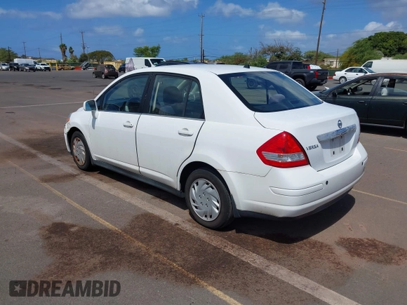2009 Nissan Versa 1.8 S with VIN 3N1BC11E99L371998, listed as a IAAI auction lot 41723771 with 130,172 mi miles. Bid and sale history available at carsss.com. Image 3.