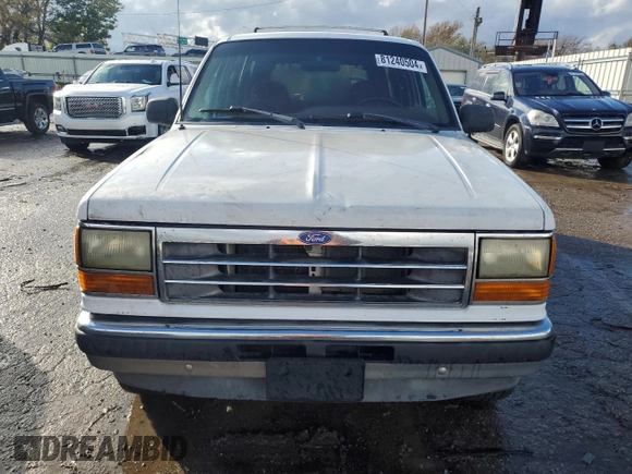 1992 Ford Explorer Eddie Bauer with VIN 1FMDU34X6NUC14663, listed as a Copart auction lot 81240504 with 98,907 mi miles and Salvage title. Bid and sale history available at DreamBid. Image 5.