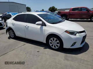 2014 Toyota Corolla L with VIN 5YFBURHE8EP069548, listed as a Copart auction lot 61000225 with 119,711 mi miles and Salvage title. Bid and sale history available at DreamBid. Image 4.