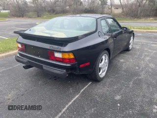 1987 Porsche 944 z VIN WP0AA2958HN152067, wystawiony jako Copart lot #53847675 z przebiegiem 46 994 mil mil oraz Szkoda całkowita • Salvage title. Historia ofert i sprzedaży dostępna na DreamBid. Obrazek 4.