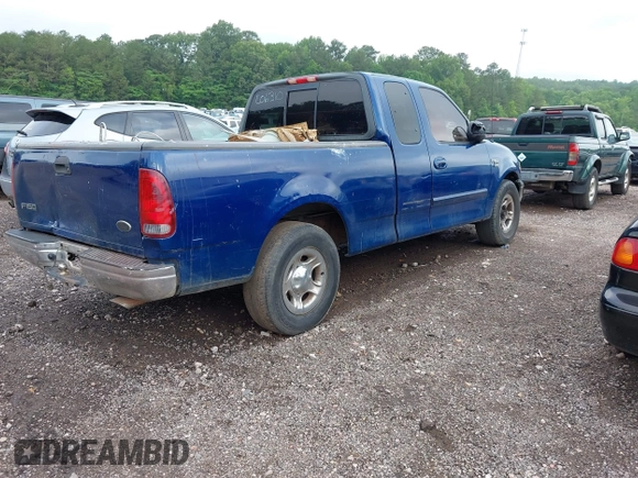 2002 Ford F-150 XL with VIN 1FTRX17W12NC06310, listed as a IAAI auction lot 42160213 with Not provided miles and . Bid and sale history available at DreamBid. Image 4.