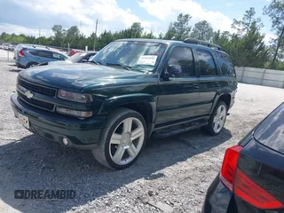 2001 Chevrolet Tahoe LS with VIN 1GNEK13T11R220134, listed as a IAAI auction lot 41965690 with 265,403 mi miles. Bid and sale history available at carsss.com. Image 2.