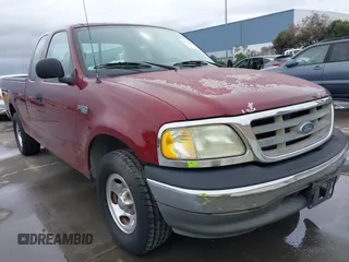 2003 Ford F-150 XL with VIN 1FTRX172X3NA92032, listed as a IAAI auction lot 41725879 with 1 mi miles. Bid and sale history available at carsss.com. Image 1.