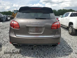 2014 Porsche Cayenne S Hybrid with VIN WP1AE2A29ELA51406, listed as a Copart auction lot 61163965 with 99,047 mi miles and Clean title. Bid and sale history available at DreamBid. Image 6.