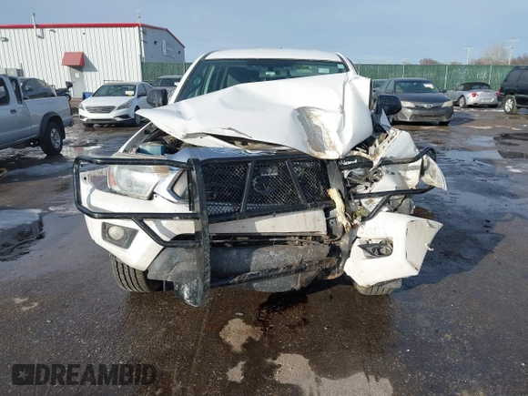 2014 Toyota Tacoma with VIN 3TMLU4ENXEM134872, listed as a IAAI auction lot 41303669 with 167,548 mi miles. Bid and sale history available at carsss.com. Image 6.