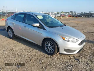 2017 Ford Focus SE z VIN 1FADP3F24HL304407, wystawiony jako IAAI lot #42215590 z przebiegiem 143 241 mil mil oraz . Historia ofert i sprzedaży dostępna na DreamBid. Obrazek 1.