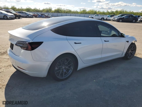 2021 Tesla Model 3 Standard Range Plus with VIN 5YJ3E1EA8MF074974, listed as a Copart auction lot 49626135 with 60,778 mi miles and Salvage Title. Bid and sale history available at carsss.com. Image 3.