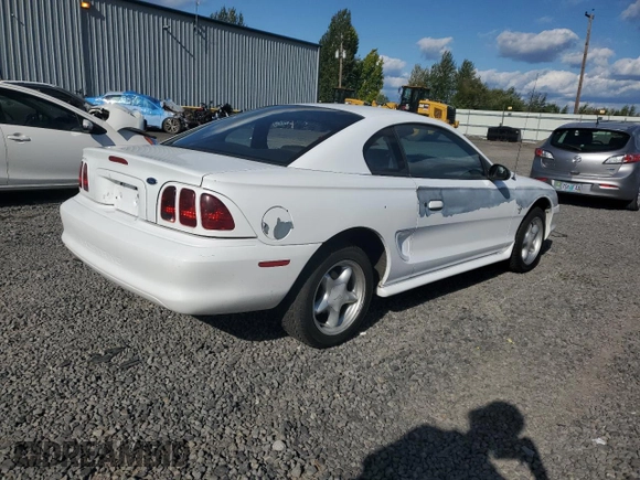 1997 Ford Mustang with VIN 1FALP4042VF119326, listed as a Copart auction lot 69286674 with 120,842 mi miles and Salvage Title. Bid and sale history available at carsss.com. Image 3.