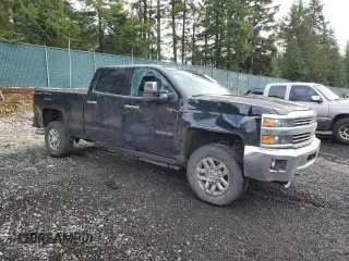2015 Chevrolet Silverado 3500HD LTZ with VIN 1GC4K0E80FF509652, listed as a Copart auction lot 45758655 with 58,456 mi miles and Salvage Title. Bid and sale history available at DreamBid. Image 4.