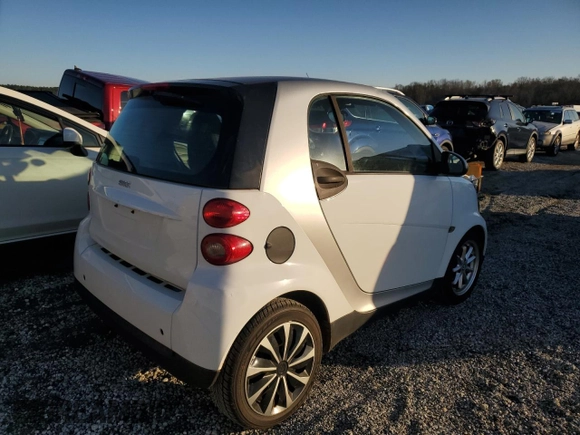 2010 Smart fortwo Pure with VIN WMEEJ3BA4AK363015, listed as a Copart auction lot 48892365 with 70,766 mi miles and Salvage title. Bid and sale history available at DreamBid. Image 3.