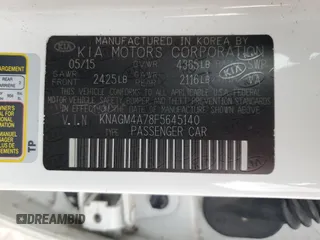2015 Kia Optima LX z VIN KNAGM4A78F5645140, wystawiony jako Copart lot #53364945 z przebiegiem 91 649 mil mil oraz Szkoda całkowita • Salvage title. Historia ofert i sprzedaży dostępna na DreamBid. Obrazek 12.