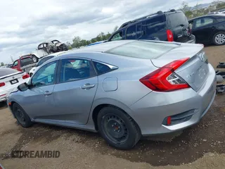 2018 Honda Civic LX with VIN 2HGFC2F50JH500559, listed as a IAAI auction lot 42040271 with 82,026 mi miles and . Bid and sale history available at DreamBid. Image 14.
