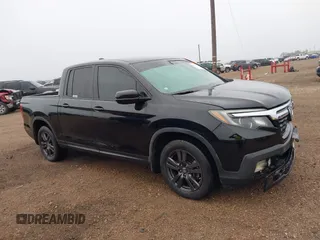 2019 Honda Ridgeline Sport z VIN 5FPYK2F18KB007749, wystawiony jako IAAI lot #41478132 z przebiegiem 100 457 mil mil oraz . Historia ofert i sprzedaży dostępna na DreamBid. Obrazek 13.