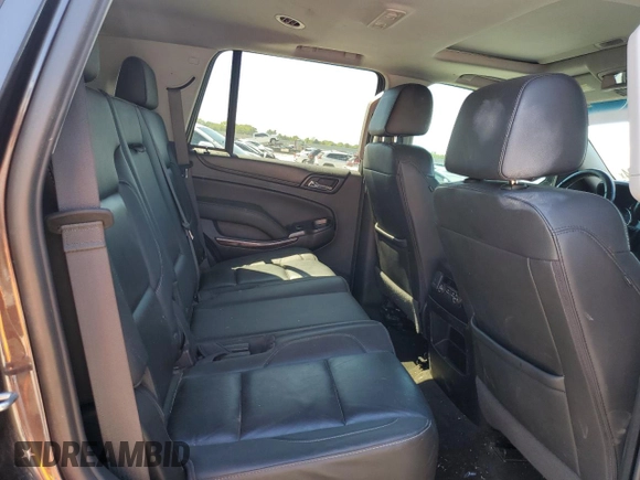 2018 Chevrolet Tahoe LT with VIN 1GNSCBKC7JR177782, listed as a Copart auction lot 73240494 with 138,296 mi miles and Salvage title. Bid and sale history available at DreamBid. Image 11.