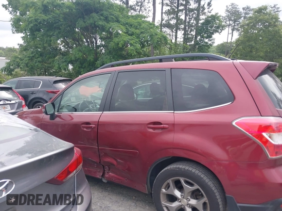 2015 Subaru Forester Touring z VIN JF2SJAWC9FH430053, wystawiony jako IAAI lot #42285876 z przebiegiem 110 888 mil mil oraz . Historia ofert i sprzedaży dostępna na DreamBid. Obrazek 14.