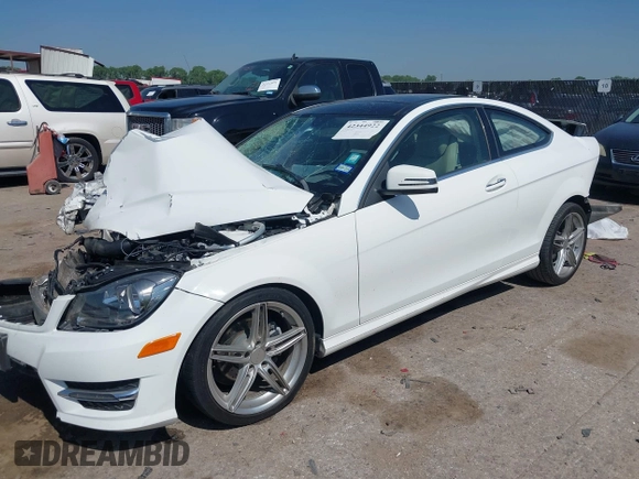 2014 Mercedes-Benz C 250 with VIN WDDGJ4HB1EG252546, listed as a IAAI auction lot 42344922 with 128,970 mi miles and . Bid and sale history available at DreamBid. Image 2.