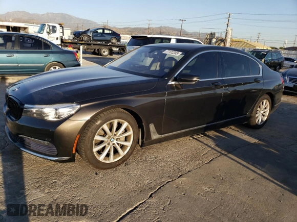 2016 BMW 7 Series 740i with VIN WBA7E2C59GG504533, listed as a Copart auction lot 77122283 with 68,209 mi miles. Bid and sale history available at carsss.com. Image 1.
