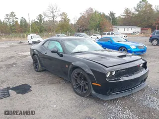 2023 Dodge Challenger R/T Scat Pack with VIN 2C3CDZFJ5PH527578, listed as a IAAI auction lot 41052102 with 60,599 mi miles. Bid and sale history available at carsss.com. Image 1.