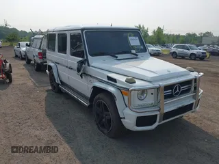 2014 Mercedes-Benz G 63 AMG z VIN WDCYC7DF9EX214804, wystawiony jako IAAI lot #42420218 z przebiegiem 89 109 mil mil oraz . Historia ofert i sprzedaży dostępna na DreamBid. Obrazek 1.