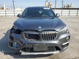 2018 BMW X1 sDrive28i with VIN WBXHU7C35J5L09783, listed as a Copart auction lot 55147935 with 37,114 mi miles and Salvage Title. Bid and sale history available at DreamBid. Image 5.