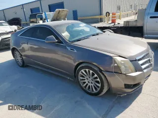 2012 Cadillac CTS Performance z VIN 1G6DJ1E35C0138308, wystawiony jako Copart lot #52984375 z przebiegiem 134 881 mil mil oraz Czysty tytuł • Clean title. Historia ofert i sprzedaży dostępna na DreamBid. Obrazek 4.