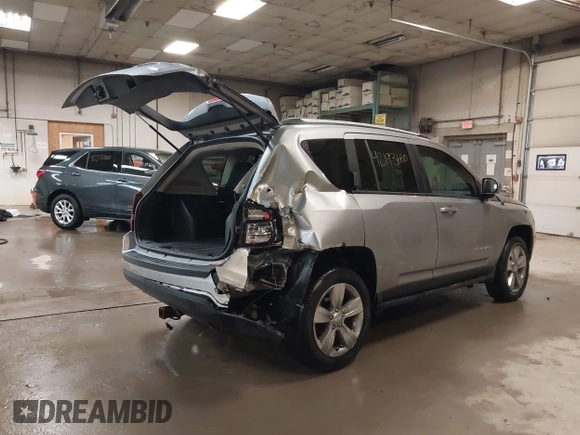 2016 Jeep Compass Latitude with VIN 1C4NJDEB4GD631759, listed as a IAAI auction lot 42193660 with 100,659 mi miles and . Bid and sale history available at DreamBid. Image 4.