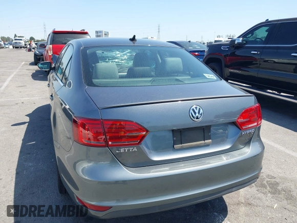 2013 Volkswagen Jetta Hybrid SE with VIN 3VW637AJ1DM232687, listed as a IAAI auction lot 41973407 with 70,428 mi miles and . Bid and sale history available at DreamBid. Image 3.