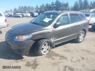 2012 Hyundai Santa Fe GLS with VIN 5XYZGDAB5CG126900, listed as a IAAI auction lot 41781584 with 124,897 mi miles. Bid and sale history available at carsss.com. Image 2.