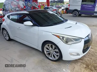 2013 Hyundai Veloster w/Gray Int with VIN KMHTC6AD4DU099795, listed as a IAAI auction lot 42763271 with 155,723 mi miles and . Bid and sale history available at DreamBid. Image 1.
