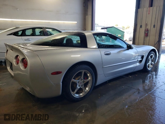 2002 Chevrolet Corvette with VIN 1G1YY22G825115140, listed as a Copart auction lot 79898774 with 64,214 mi miles and Salvage Title. Bid and sale history available at carsss.com. Image 3.