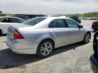 2012 Ford Fusion SE with VIN 3FAHP0HA2CR316408, listed as a Copart auction lot 52747515 with 143,948 mi miles and Salvage Title. Bid and sale history available at DreamBid. Image 3.