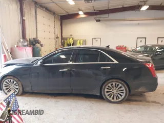 2014 Cadillac CTS Luxury AWD with VIN 1G6AX5SX2E0195357, listed as a IAAI auction lot 41677831 with 152,567 mi miles and . Bid and sale history available at DreamBid. Image 14.