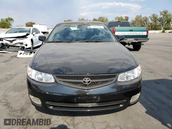 2000 Toyota Solara SE with VIN 2T1CF28P0YC337293, listed as a Copart auction lot 70659044 with 214,172 mi miles and Salvage Title. Bid and sale history available at DreamBid. Image 5.