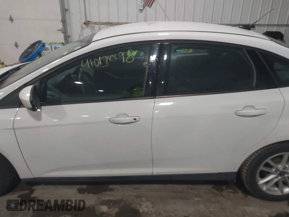 2018 Ford Focus SE with VIN 1FADP3F29JL312721, listed as a IAAI auction lot 41012098 with 126,214 mi miles. Bid and sale history available at carsss.com. Image 14.