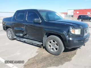 2007 Honda Ridgeline RTX with VIN 2HJYK16377H515373, listed as a IAAI auction lot 41912195 with 200,683 mi miles. Bid and sale history available at carsss.com. Image 1.