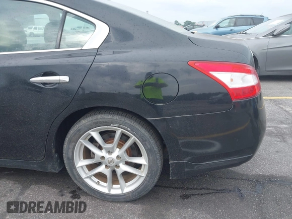 2011 Nissan Maxima SV z VIN 1N4AA5AP1BC855128, wystawiony jako IAAI lot #42372161 z przebiegiem 189 514 mil mil oraz . Historia ofert i sprzedaży dostępna na DreamBid. Obrazek 14.