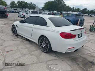 2018 BMW M4 with VIN WBS4Z9C5XJED22650, listed as a IAAI auction lot 42631888 with 41,266 mi miles and . Bid and sale history available at DreamBid. Image 3.
