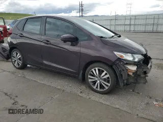2015 Honda Fit EX with VIN 3HGGK5G84FM729496, listed as a Copart auction lot 55996315 with 91,310 mi miles and Salvage title. Bid and sale history available at DreamBid. Image 4.