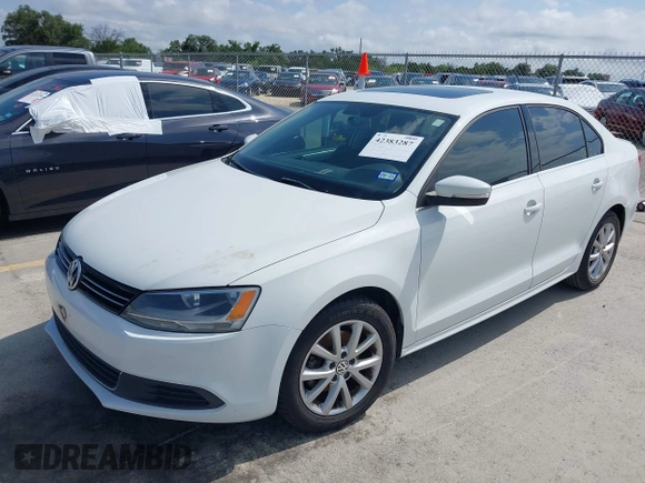 2014 Volkswagen Jetta SE with VIN 3VWD07AJ2EM444256, listed as a IAAI auction lot 42383287 with 99,654 mi miles and . Bid and sale history available at DreamBid. Image 2.
