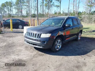 2011 Jeep Compass with VIN 1J4NT1FA4BD208116, listed as a IAAI auction lot 41604552 with 179,633 mi miles. Bid and sale history available at carsss.com. Image 2.